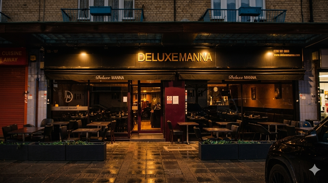 Deluxe Manna restaurant exterior at night